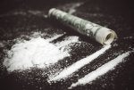 drugabuse_shutterstock-217852807-cocaine-on-table-rolled-bill.jpg